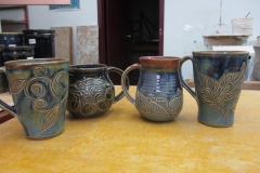 One of a Kind Carved Mugs